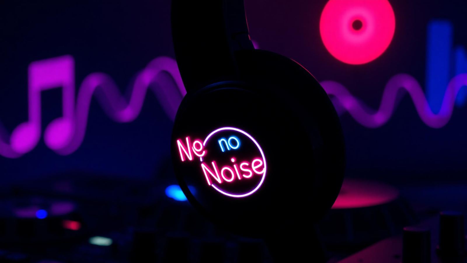 NO NOISE LED silent disco headphones glowing amid neon lights, illustrating playlist planning